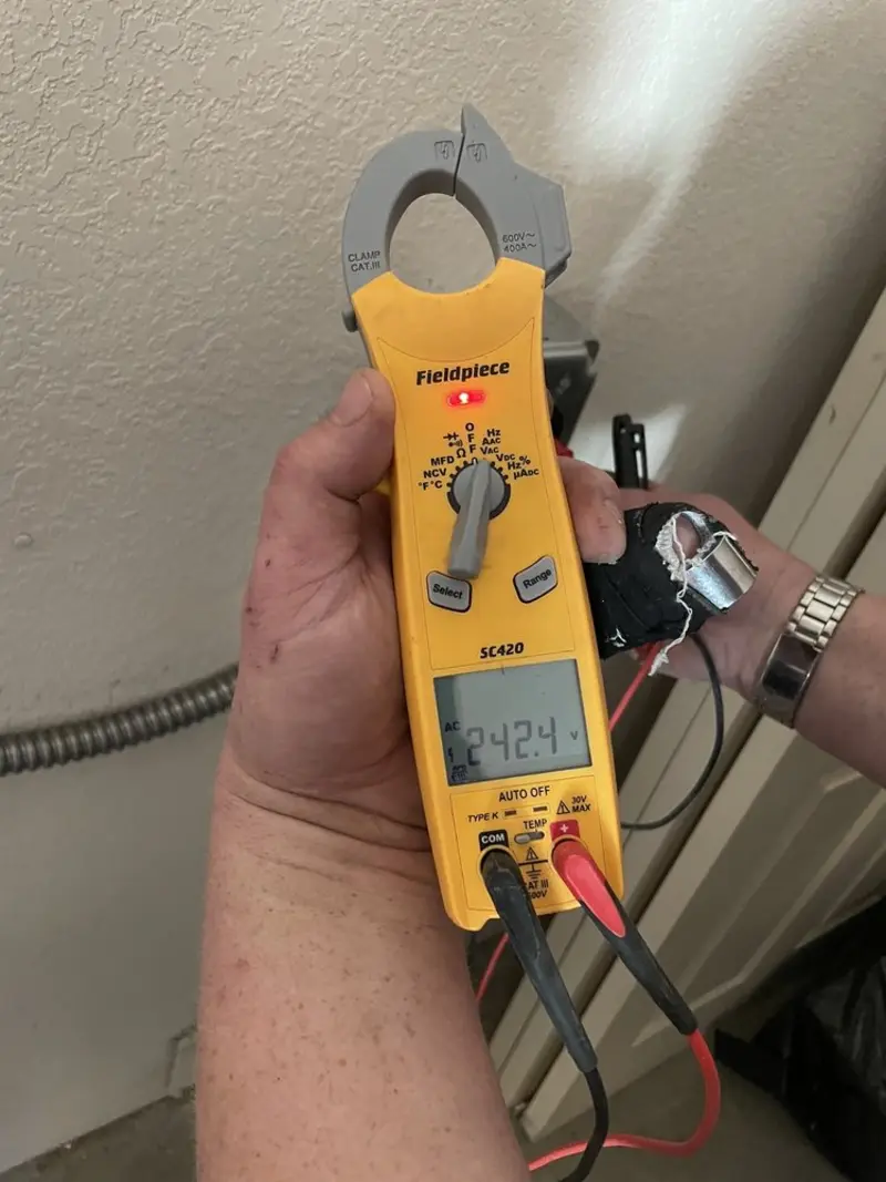 Voltage testing with clamp meter during Aluminum Wiring Replacement in Eldridge